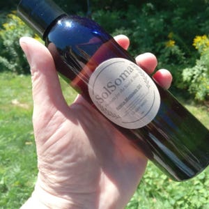Arnica Massage Oil – 8 oz | Sun Infused dried Arnica Flowers in Rice Bran Oil
