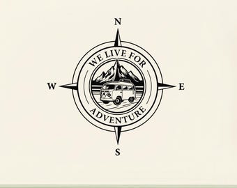 May include: A black vinyl decal applied to the side of a white camper trailer. The design features a compass rose with the text WE LIVE FOR ADVENTURE, a mountain range, and a small van illustration centered within the circular compass frame.