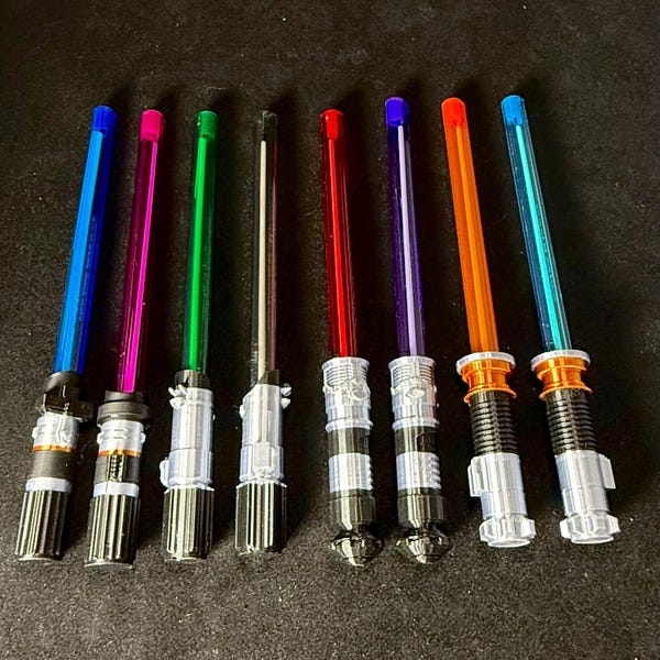 Tappo per penna con spada laser e penna