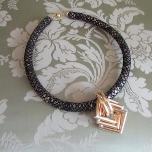 Genuine leather chocker necklace with gold metal pendant