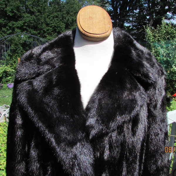 Black ,female mink fur coat, size large,