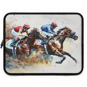 May include: Laptop sleeve featuring a watercolor painting of a horse race. Two jockeys in red and blue riding gear are racing on brown horses. The artwork has a splash of color and a black border.
