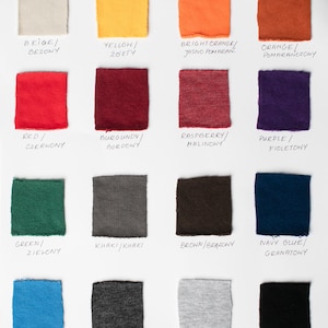 May include: A color chart with 16 fabric swatches, each labeled with a color name in English and Polish. The colors include beige, yellow, orange, red, burgundy, raspberry, purple, green, khaki, brown, navy blue, blue, gray, light gray, and black.