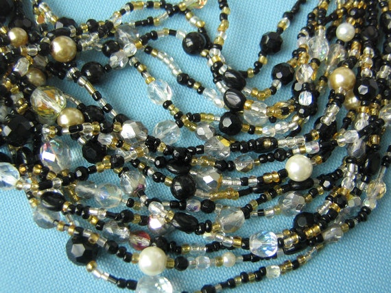 Joan Rivers Black, Gold, and Pearl Multi-Strand Cr
