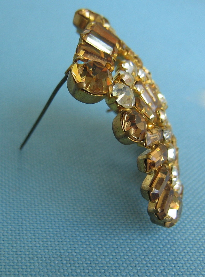 Stunning Made in Austria Faux Topaz and Faux Diamond Gold Tone Pinwheel Brooch and Matching Clip Earrings