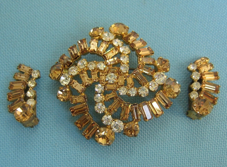Stunning Made in Austria Faux Topaz and Faux Diamond Gold Tone Pinwheel Brooch and Matching Clip Earrings