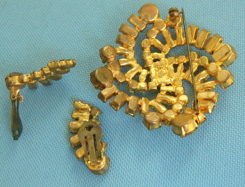 Stunning Made in Austria Faux Topaz and Faux Diamond Gold Tone Pinwheel Brooch and Matching Clip Earrings