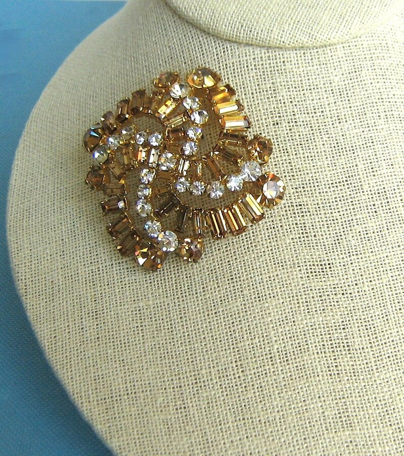 Stunning Made in Austria Faux Topaz and Faux Diamond Gold Tone Pinwheel Brooch and Matching Clip Earrings