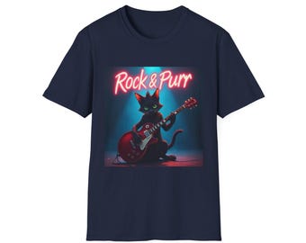 May include: A navy blue t-shirt with a black cat playing an electric guitar. The cat is wearing a red guitar strap and the text "Rock & Purr" is in neon pink letters above the cat.