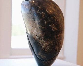 Stone sculpture peridotite vase oxidized copper inlay Gros Morne