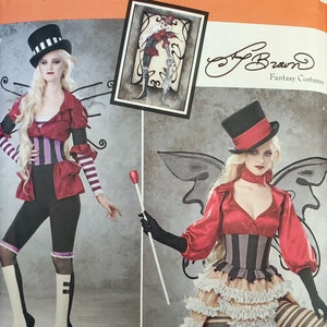 May include: Simplicity sewing pattern number 1301 H5 for a fantasy costume. The pattern includes instructions for a red and black striped corset, a red top, a white and black striped skirt, and black and white striped tights. The pattern also includes instructions for a top hat, wings, and a wand. The pattern is designed by Tony Braun.