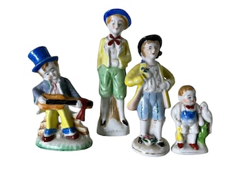 Occupied Japan figures 1940s children figures collectible porcelain figures made in Occupied Japan vintage display set of four figures