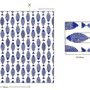 May include: A white fabric with a repeating pattern of blue fish. The fabric is 90 inches wide and the pattern repeats every 5.6 inches. The fish are 2 inches tall.