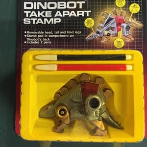 Dinobot Snarl take apart Stamp G1 Transformers rare toy nos HG toys