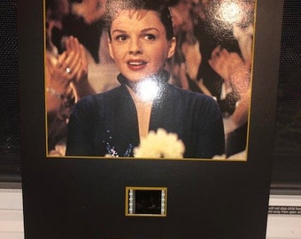 A star is born Judy Garland movie promo items 8x10 glossy photos packet and film display