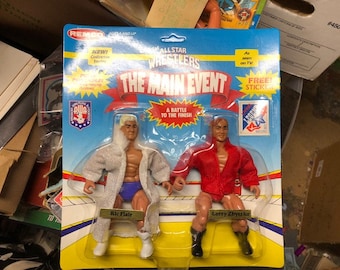 1983 Remco AWA Todos los luchadores estelares Evento principal Ric Flair vs Larry Zbyszko MOC viejo caso de stock fresco