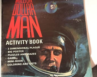 Six Million Dollar Man activity book new old stock mint games puzzles poster and more NM+ oop 1974