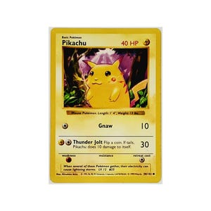 May include: A yellow Pikachu Pokemon card from the 1995-1996 set. The card features a cartoon image of Pikachu with the text "Basic Pokemon Pikachu 40 HP" at the top. The card also includes the text "Gnaw 10" and "Thunder Jolt 30" for the Pokemon's attacks.