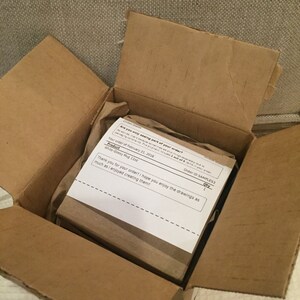 May include: A white glossy mug with the text "Thank you for your order! I hope you enjoy the drawings as much as I enjoyed creating them!" printed on a white paper inside a brown cardboard box.