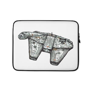 May include: A white laptop sleeve with a detailed illustration of a spaceship. The artwork shows a grey and silver spacecraft with intricate paneling and a distinctive front section. The sleeve has a black border and a zip closure.