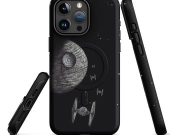 May include: A black smartphone case featuring a space-themed graphic with a large grey spherical space station and three small TIE fighter spacecraft. The design includes a circular magnetic charging ring outline and scattered white star-like dots.
