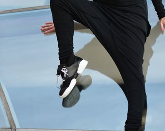 Black Leather Sneakers: Edgy Designer Women's Shoes