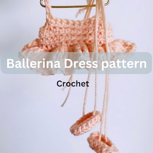 May include: A crochet ballerina dress pattern with instructions for making a pink dress and matching shoes. The pattern is called "Ballerina Dress pattern Crochet".