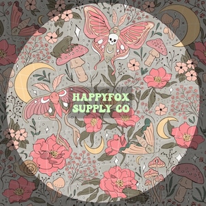 May include: A seamless pattern featuring pink and white butterflies, mushrooms, flowers, and crescent moons on a grey background. The text "HAPPYFOX SUPPLY CO" is in the centre of the pattern.