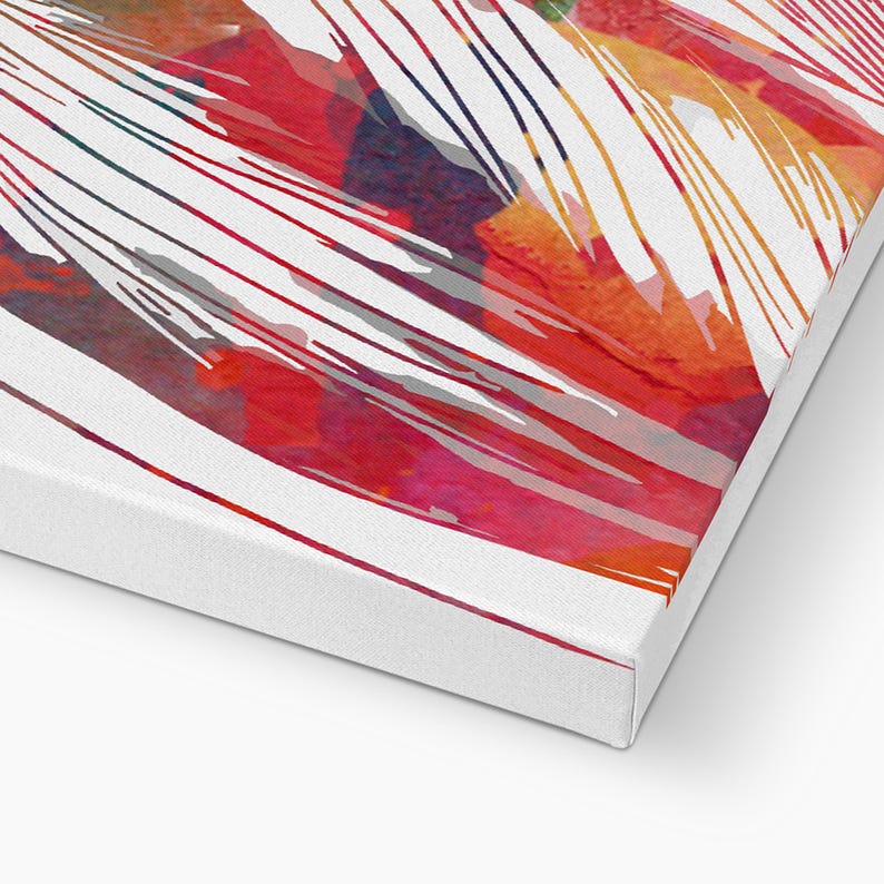 May include: A canvas print featuring an abstract watercolor design. The artwork showcases a vibrant mix of red, orange, and pink hues, with white linear brushstrokes. The canvas is stretched over a wooden frame, creating a modern art piece.