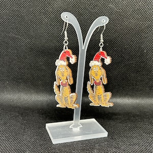 Wie der Grinch Weihnachten Hund Max Ohrringe stahl