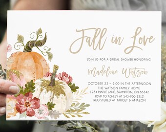 May include: Fall in Love bridal shower invitation featuring a watercolour illustration of pumpkins and flowers. The invitation includes the date, time, location, and RSVP details.