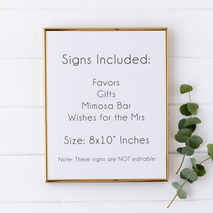 May include: A gold-framed sign with the text "Signs Included: Favors, Gifts, Mimosa Bar, Wishes for the Mrs. Size: 8x10" Inches. Note: These signs are NOT editable."