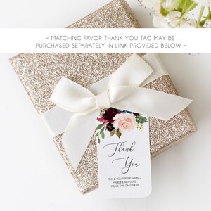 May include: A gold glitter gift box with a white satin ribbon and a thank you tag with a floral design and the text "Thank You" and "Thank you for showering Madeline with love. Please take one! Enjoy."