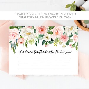 May include: A white card with a floral border of pink and white flowers. The card has the text "Advice for the bride-to-be" and lined space for writing.
