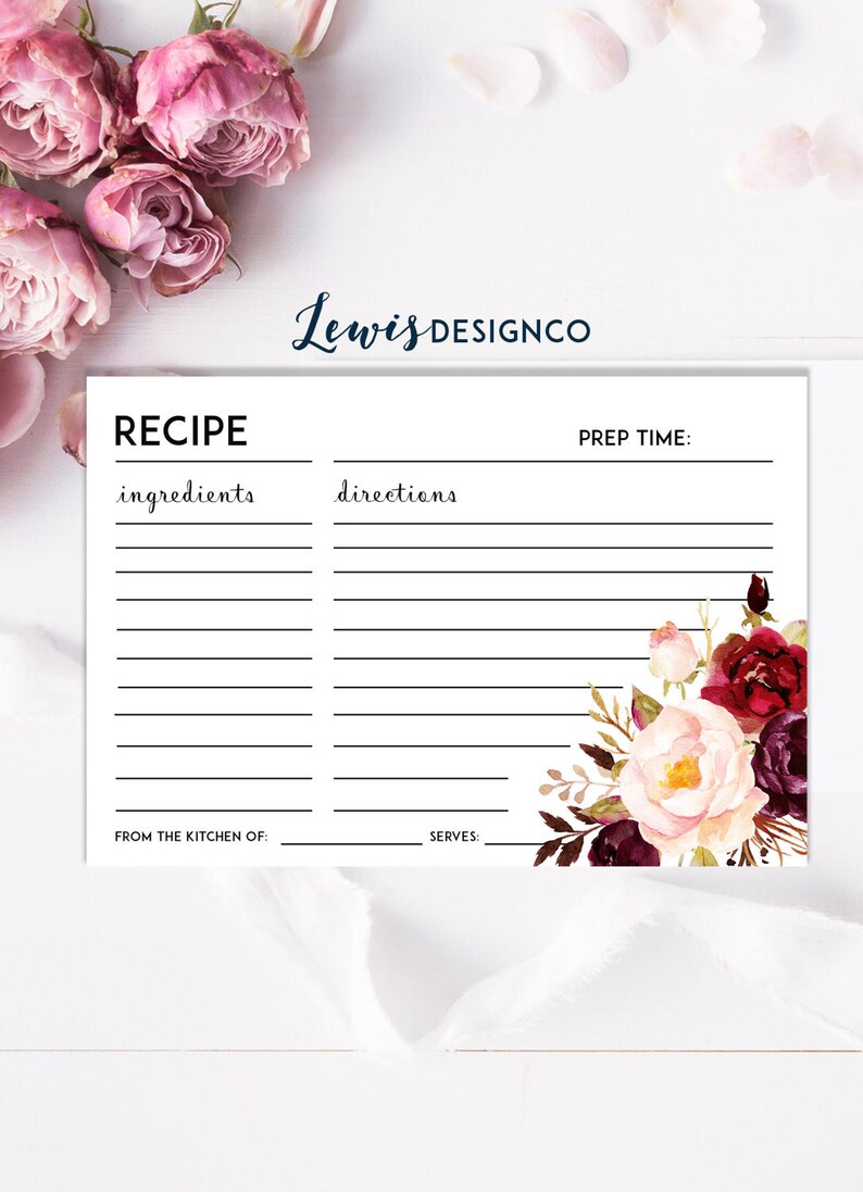 May include: Printable recipe card with a floral design featuring burgundy, pink, and white flowers. The card has sections for ingredients, directions, prep time, from the kitchen of, and serves.