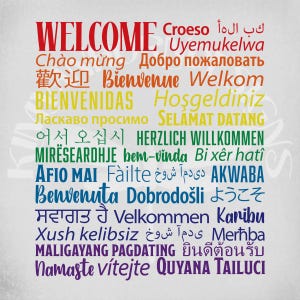 May include: A colourful graphic displaying the word "WELCOME" in various languages. The languages are written in different colours, including red, yellow, green, and blue. The image is on a white background.