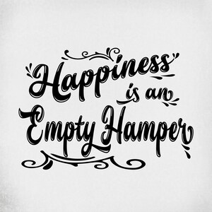 May include: Black text on a white background reads "Happiness is an Empty Hamper" in a decorative script font. The text is surrounded by decorative flourishes.