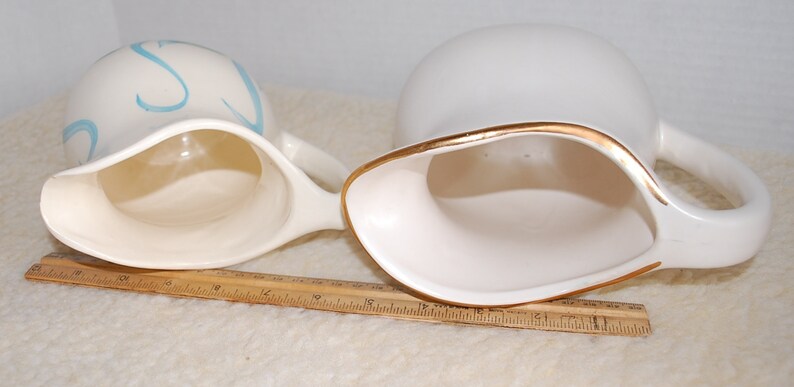 Pair of Unique McCoy /& R.R.P.C Pitchers