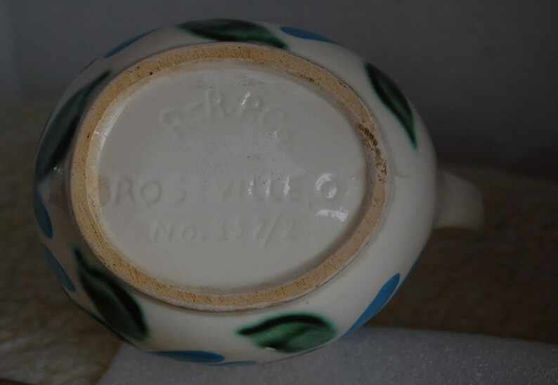 Pair of Unique McCoy /& R.R.P.C Pitchers