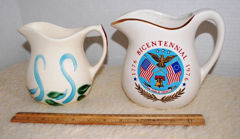 Pair of Unique McCoy /& R.R.P.C Pitchers