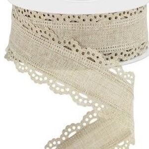 May include: A roll of beige linen ribbon with a delicate lace trim. The ribbon has a subtle texture and a scalloped edge.