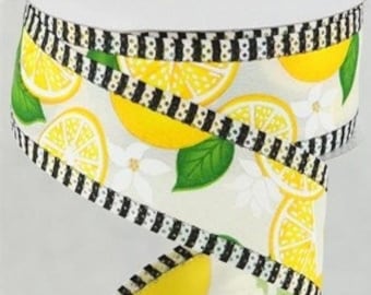 May include: White ribbon with a black and white striped border. The ribbon features a lemon print with green leaves and white flowers.