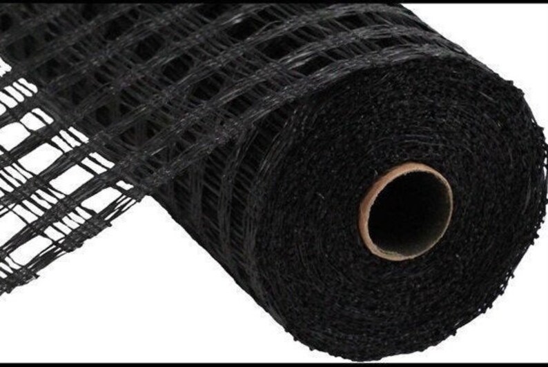 May include: A roll of black mesh ribbon with a grid pattern. The ribbon is rolled up and the end is unfurled, showing the texture of the mesh.