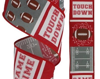 May include: Red, white, and gray ribbon with a football theme. The ribbon features footballs, a football helmet, and the words "Game Time" and "Touch Down".