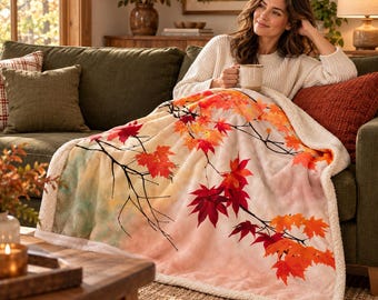 Coperta Sherpa con foglie autunnali e motivo a foglie d'acero, disponibile in due misure.