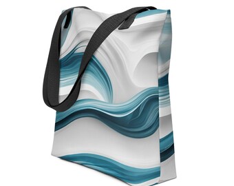May include: A white tote bag with a blue abstract design. The bag has black straps.