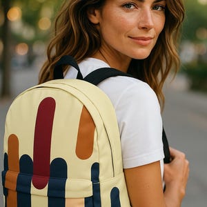 Modern Abstract Backpack – Rust, Black & Gold Design on Yellow, Artistic School Bag for Students, Stylish Laptop Daypack