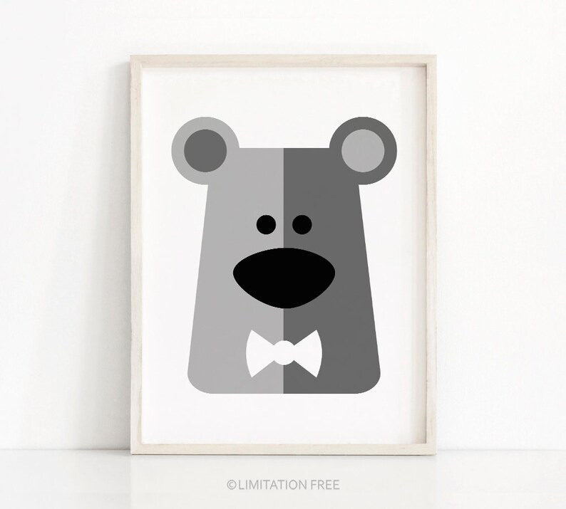 May include: A black and white illustration of a bear wearing a bow tie. The bear has a simple, cartoon-like design with large ears, a wide smile, and two small eyes.