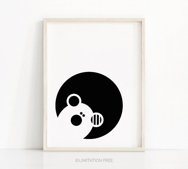May include: Black and white illustration of a bear's face in a circle.