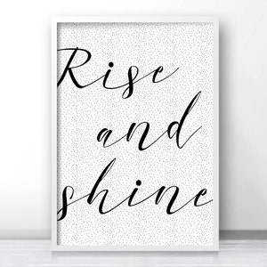 May include: Black and white printable wall art with a white background and black polka dots. The text "Rise and shine" is written in a cursive font.